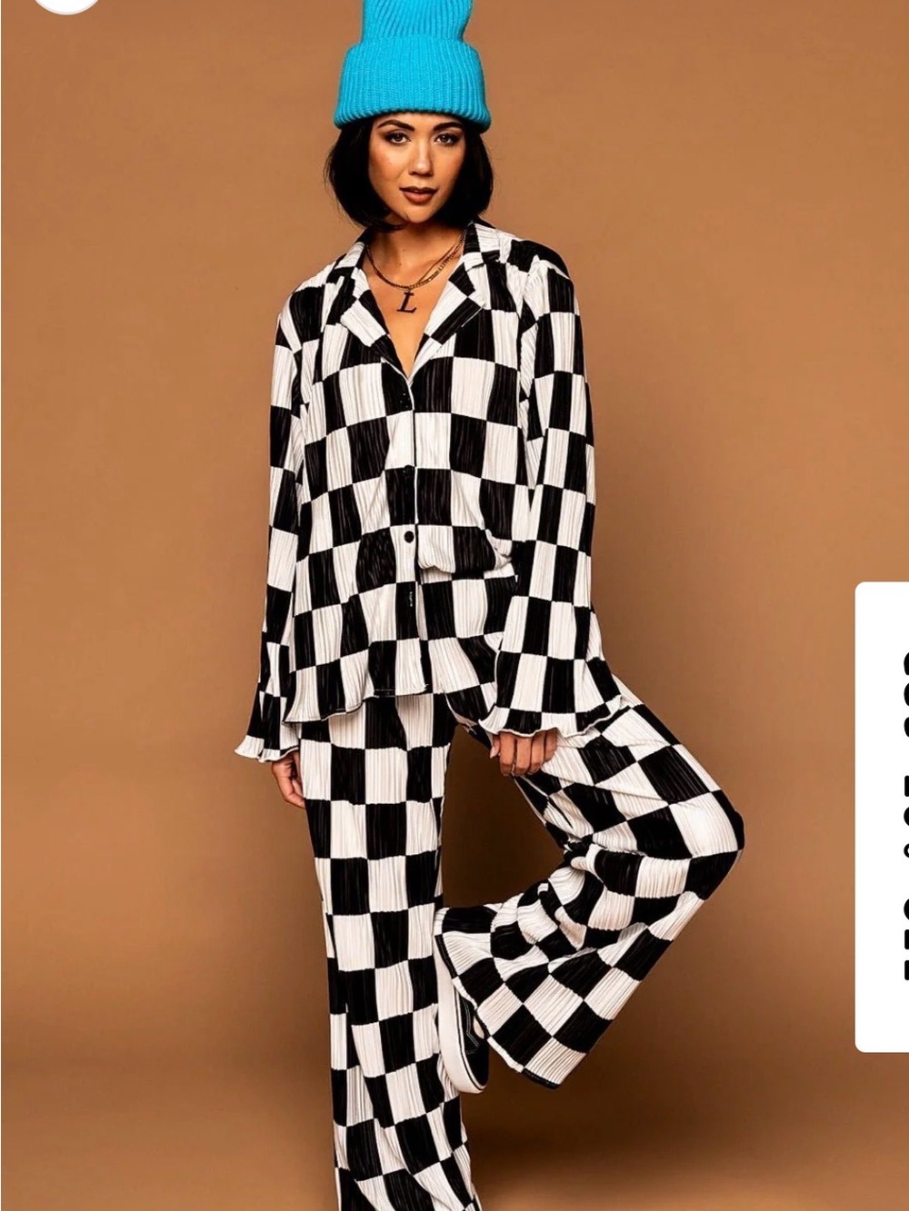 Dressed in LALA Long Sleeve Plissé
Set in Checkerboard